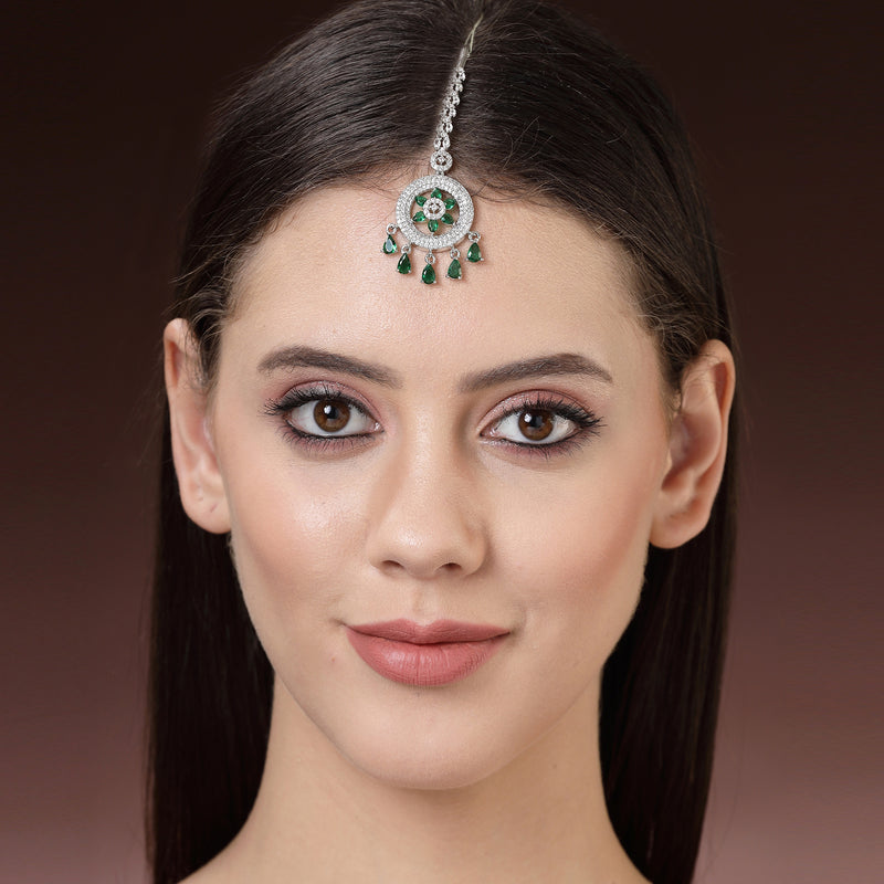 Rhodium Plated Silver Toned Green American Diamond Studded Maang Tikka with Elegant Dangling Stones