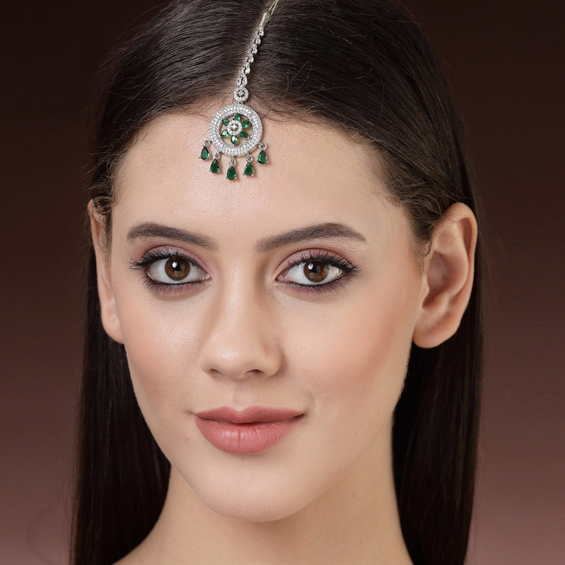Rhodium Plated Silver Toned Green American Diamond Studded Maang Tikka with Elegant Dangling Stones