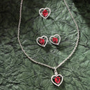 Rhodium Plated Silver Toned Heart Shaped Ruby Red American Diamond Studded Pendant Combo With Ring