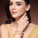 Gold Plated Floral Shaped White Pearl Studded Bangles Set Of 2