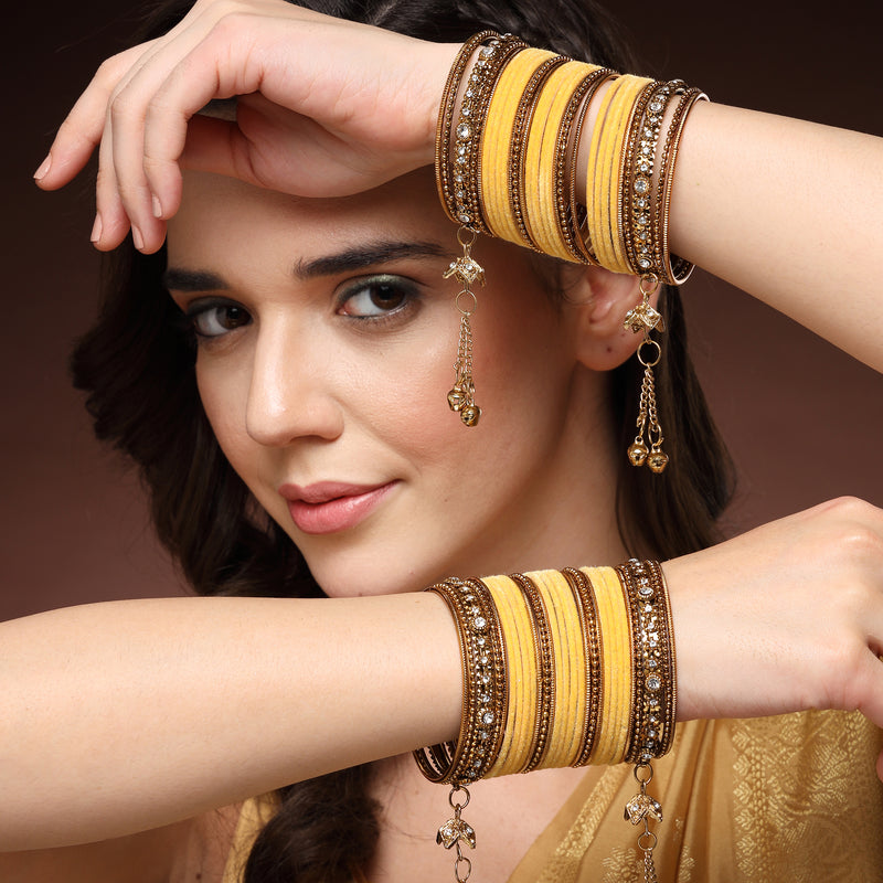 Gold-Plated Yellow Matte Finish Velvet Cz Studded Tasselled Bangles Set Of 56