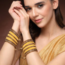 Gold-Plated Yellow Matte Finish Velvet Cz Studded Tasselled Bangles Set Of 56