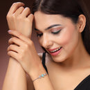 Rhodium Plated Silver Toned Sea Green And White American Diamond Studded Adjustable Bracelet