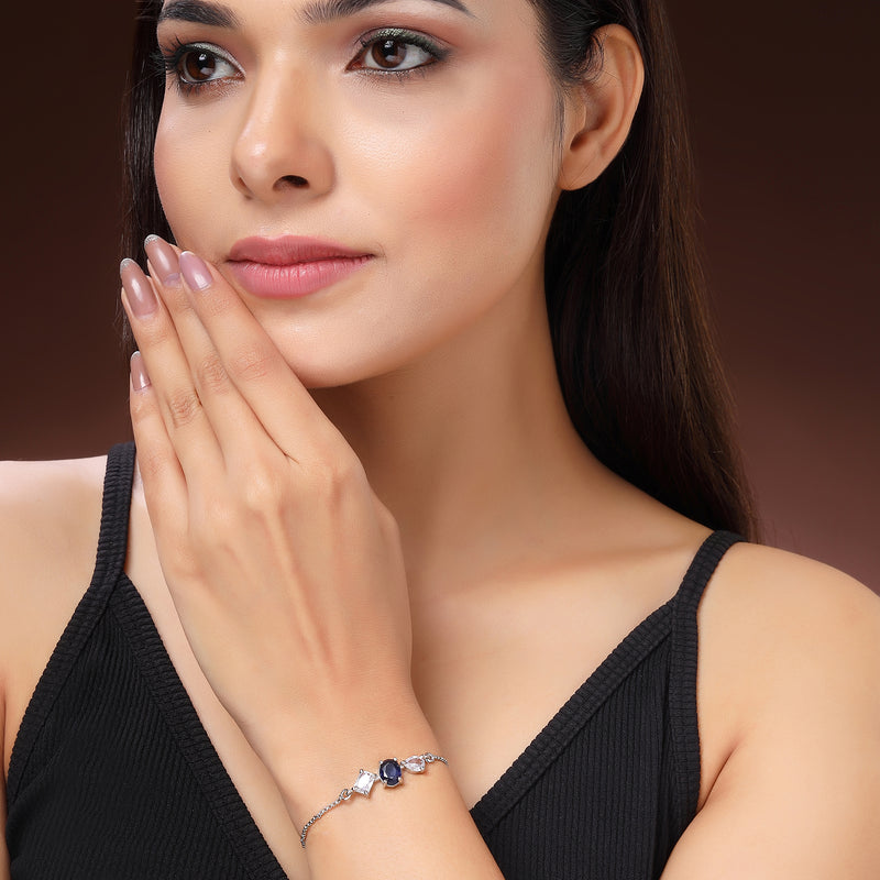 Rhodium Plated Silver Toned Blue And White American Diamond Studded Adjustable Bracelet