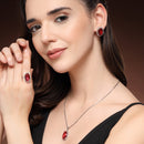 Rhodium Plated Silver Toned Red & White American Diamond Studded Oval Shaped Pendant Combo With Ring