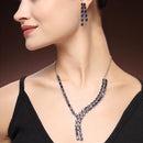 Rhodium Plated Silver Toned Teardrop Shaped Blue American Diamond Studded Jewellery Set