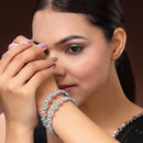 Rhodium Plated Silver Toned Floral Shaped Sea Green & Pink American Diamond Studded Bangles Set Of 2