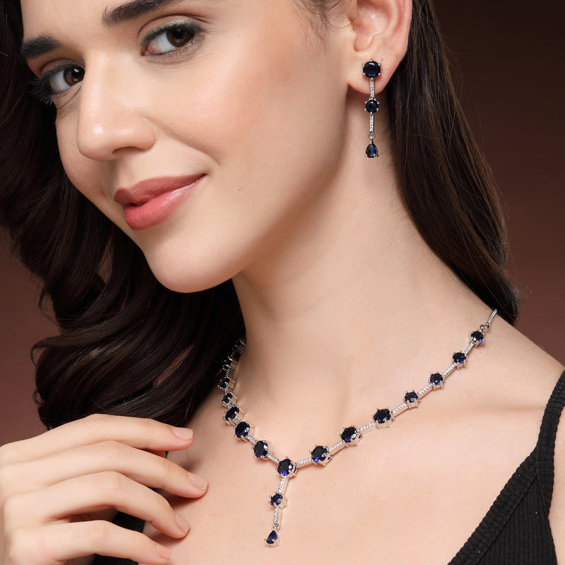 Rhodium Plated Silver Toned Circle Shaped Blue American Diamond Studded Jewellery Set