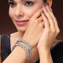Rhodium Plated Silver Toned Oval Shaped White American Diamond Studded Bangles Set Of 2