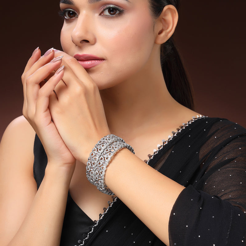 Rhodium Plated Silver Toned Teardrop Shaped White American Diamond Studded Bangles Set Of 2