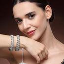 Gold Plated Floral Shaped Blue & White Cubic Zirconia Studded Bangles Set Of 2