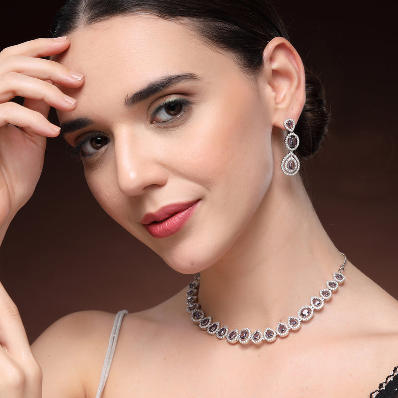 Rhodium Plated Silver Toned Teardrop Shaped Purple & White American Diamond Studded Jewellery Set