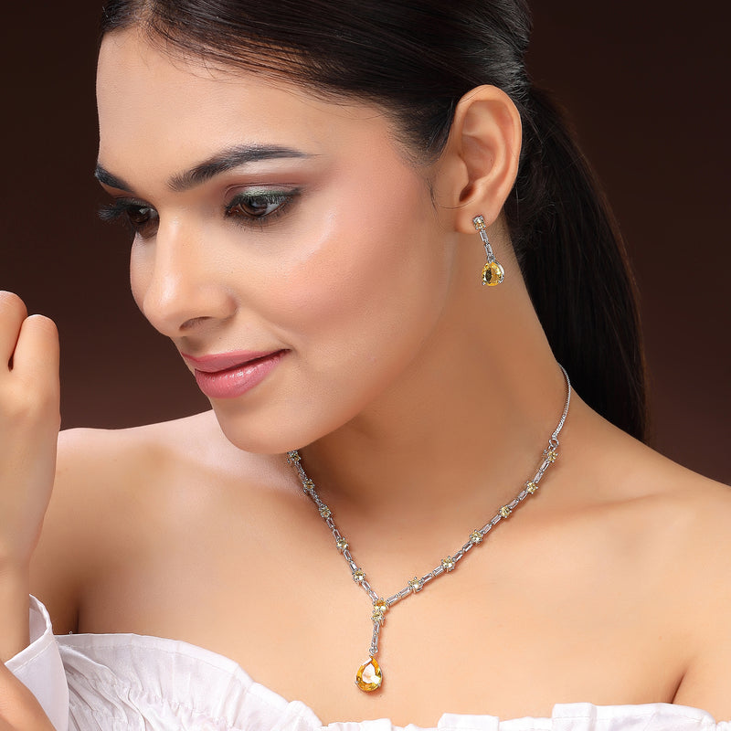 Rhodium Plated Silver Toned Teardrop Shaped Yellow & White American Diamond Studded Necklace With Earrings Jewellery Set