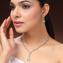 Rhodium Plated Silver Toned Teardrop Shaped Sea Green & White American Diamond Studded Jewellery Set