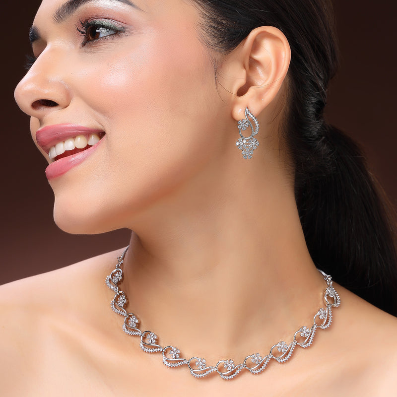 Rhodium Plated Silver Toned Floral Shaped White American Diamond Studded Jewellery Set