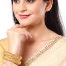 Set Of 4 Gold-Toned Textured Bangles