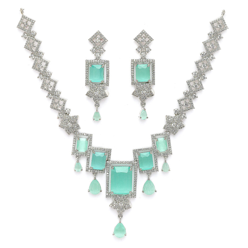 Rhodium Plated Silver Toned Rectangular Shaped Sea Green & White American Diamond Studded Jewellery Set