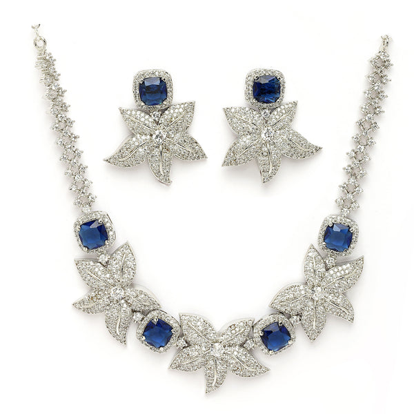 Rhodium Plated Silver Toned Floral Shaped Blue & White American Diamond Studded Jewellery Set