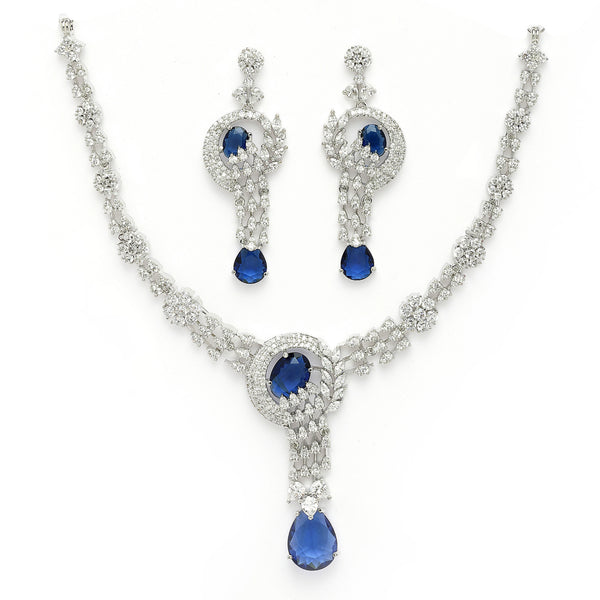 Rhodium Plated Silver Toned Floral Teardrop Shaped Navy Blue & White American Diamond Studded Jewellery Set