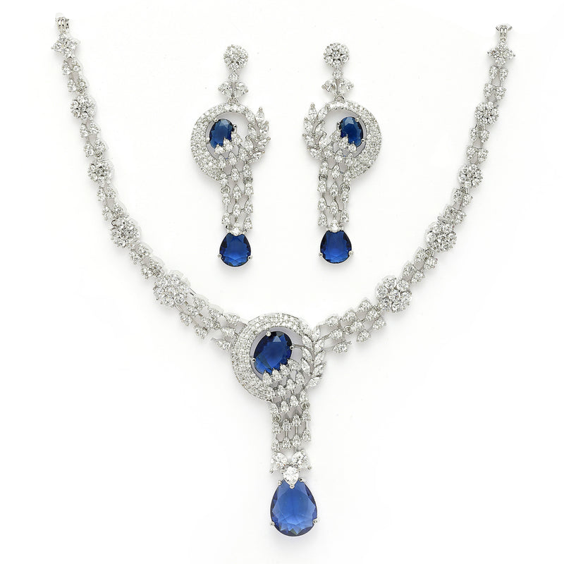 Rhodium Plated Silver Toned Floral Teardrop Shaped Navy Blue & White American Diamond Studded Jewellery Set
