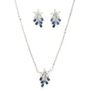 Rhodium Plated Silver Toned Blue And White American Diamond Studded Floral Teardrop Shaped Pendant Set