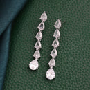 Rhodium Plated Silver Toned Teardrop Shaped White American Diamond Studded Linear Dangler Earrings