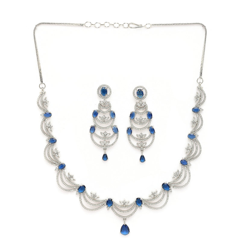 Rhodium Plated Silver Toned Crescent Shaped Blue & White American Diamond Studded Necklace With Earrings Jewellery Set