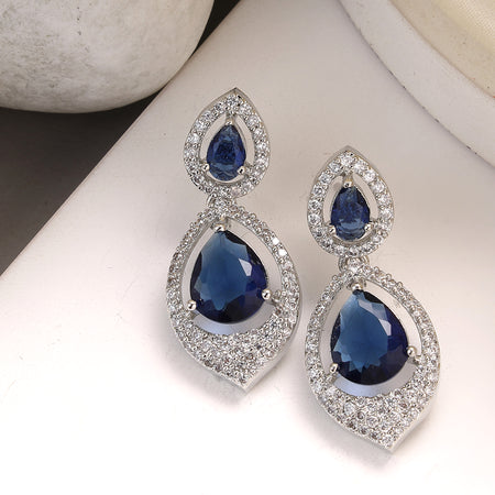 Rhodium Plated Silver Toned Blue Teardrop American Diamond Studded  Drop Earrings