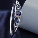 Rhodium Plated Silver Toned Blue Square & Teardrop American Diamond Studded Cuff Bracelet