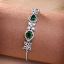 Rhodium Plated Silver Toned White Flower & Green Teardrop AD Studded Wraparound Adjustable Bracelet