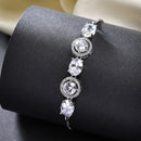 Rhodium Plated Silver Toned White Round & Oval American Diamond Studded  Wraparound Adjustable Bracelet
