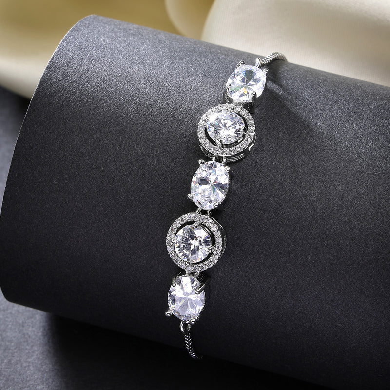 Rhodium Plated Silver Toned White Round & Oval American Diamond Studded  Wraparound Adjustable Bracelet