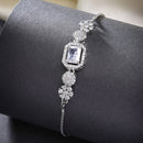 Rhodium Plated Silver Toned White Square Centerpiece American Diamond Studded Bracelet With Beads & Floral Accents Wraparound Adjustable Bracelet