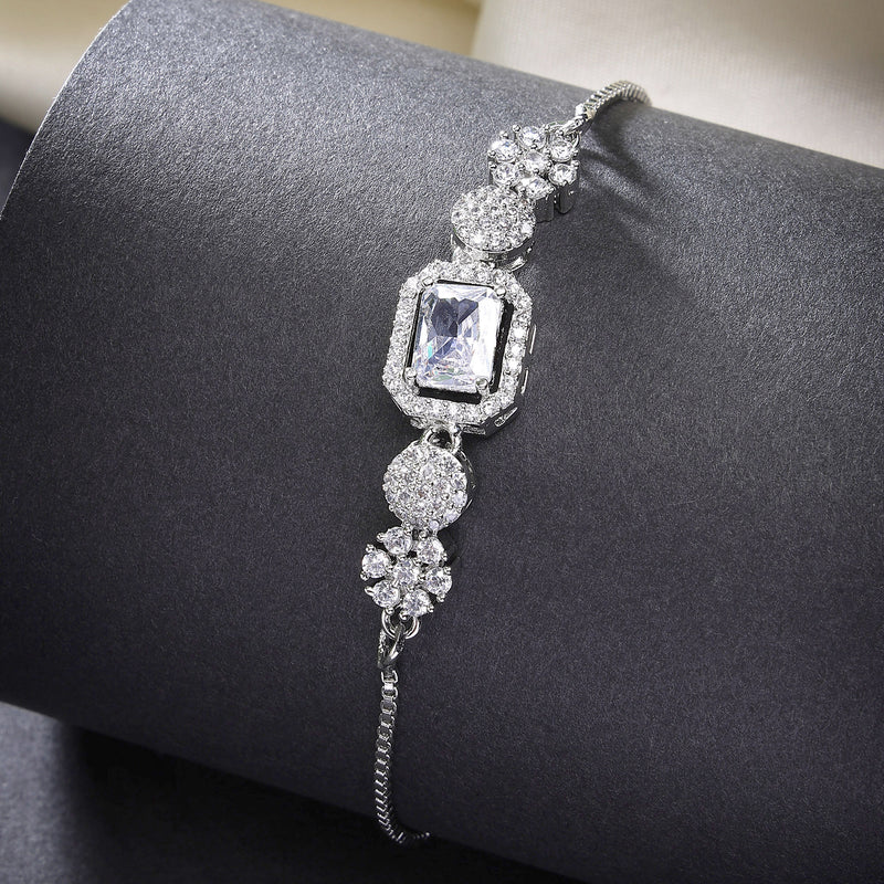 Rhodium Plated Silver Toned White Square Centerpiece American Diamond Studded Bracelet With Beads & Floral Accents Wraparound Adjustable Bracelet