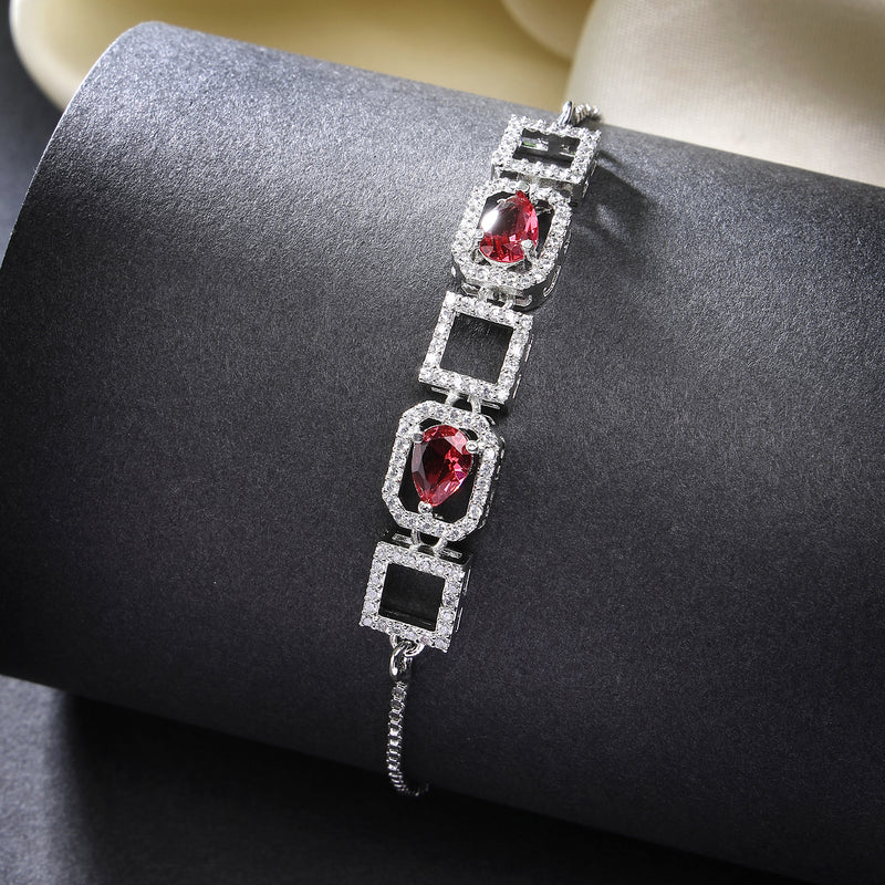 Rhodium Plated Silver Toned White Square Cut Red Teardrop American Diamond Studded  Wraparound Adjustable Bracelet