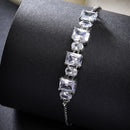 Rhodium Plated Silver Toned White Round &  Square Cut AD Studded Wraparound Adjustable Bracelet