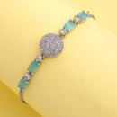 Rhodium Plated Silver Toned White And Sea Green American Diamond Studded Adjustable Bracelet