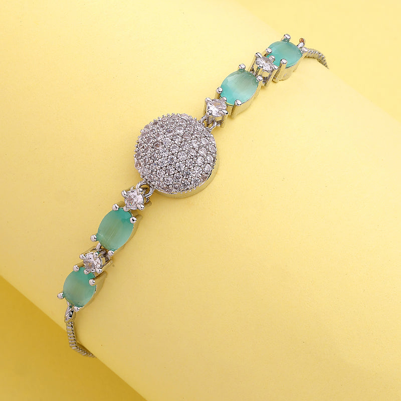 Rhodium Plated Silver Toned White And Sea Green American Diamond Studded Adjustable Bracelet