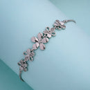 Rhodium Plated Silver Toned Floral Shaped White Cubic Zirconia Studded Adjustable Bracelet