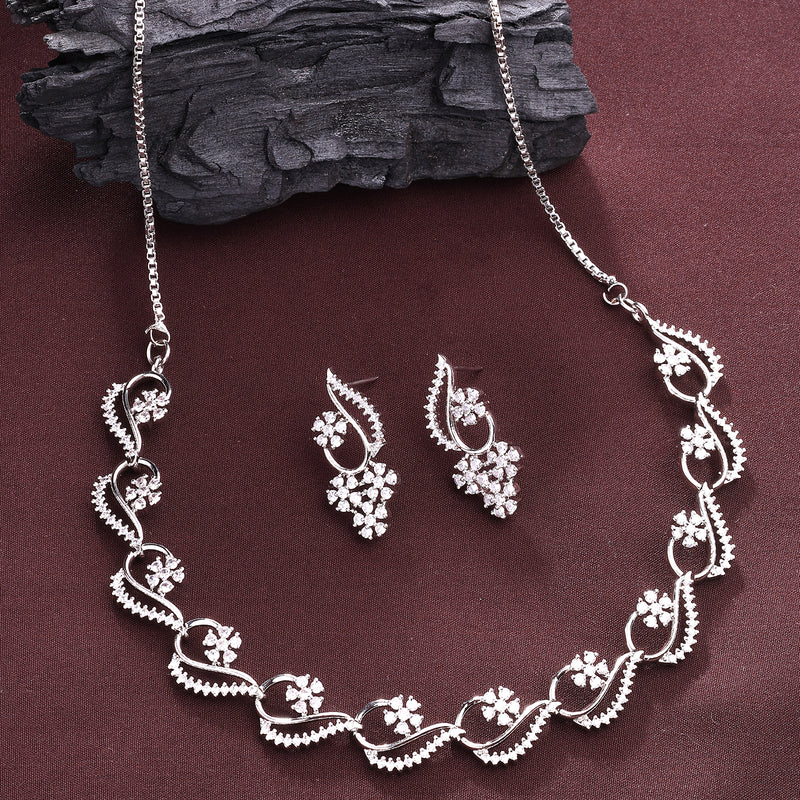 Rhodium Plated Silver Toned Floral Shaped White American Diamond Studded Jewellery Set