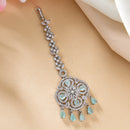 Rhodium Plated Silver Toned Floral Mint Green American Diamond Studded Maang Tikka with Elegant Dangling Stones