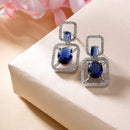 Rhodium Plated with Blue American Diamond Stylish Square Shaped Small Drop Earrings