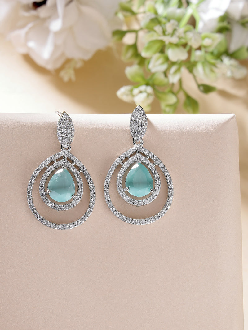 Rhodium Plated Silver Toned with Teardrop Shaped Ocean Blue & White American Diamond Drop Earrings