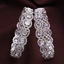 Rhodium Plated Silver Toned Bow Shaped White American Diamond Studded Bangles Set Of 2