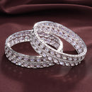 Rhodium Plated Silver Toned Oval Shaped American Diamond Studded Bangles Set Of 2