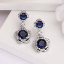 Rhodium Plated with Dual Blue American Diamonds Drop Earrings
