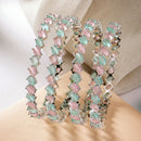 Rhodium Plated Silver Toned Sea Green & Pink Rectangle AD Studded Set Of 4 Stylish Bangles