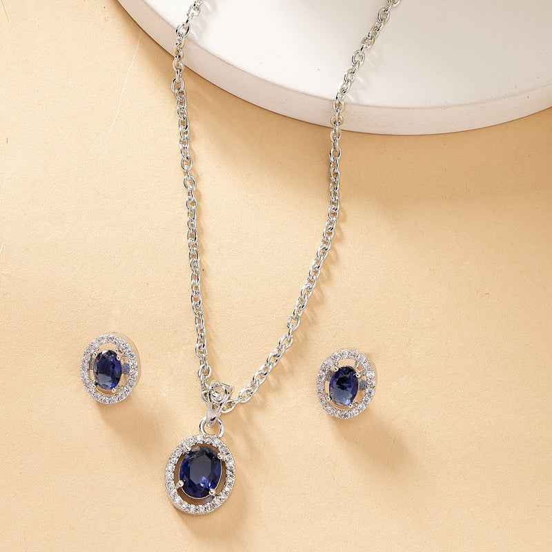 Rhodium Plated Silver Toned Oval Shaped Royal Blue American Diamond Studded Pendant Set