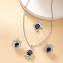 Rhodium Plated Silver Toned Royal Blue Tear dropped  Shaped American Diamond Studded Pendant Combo With Ring