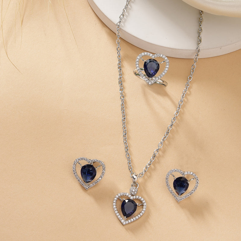 Rhodium Plated Silver Toned Heart Shaped Royal Blue American Diamond Studded Pendant Combo With Ring